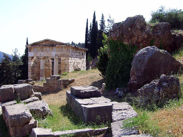 Ancient Delphi Full-Day Tour from Athens - Walking through the Temple of Apollo site