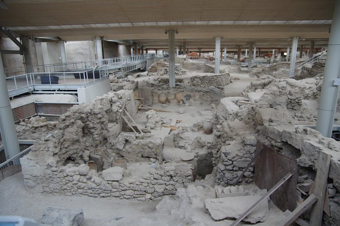 Archaeological Bus Tour To Akrotiri Excavations & Red Beach - Black volcanic sand at Perissa or Perivolos