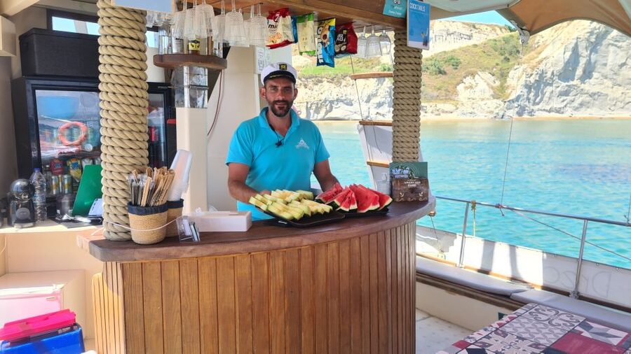 Argostoli: Full-Day Traditional Boat Cruise with Lunch - A social boat with room for families and solo visitors