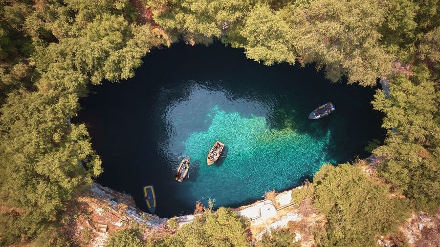 Argostoli: Melissani & Drogarati Cave Tour with Wine Tasting - Melissani Cave and the wooden boat ride
