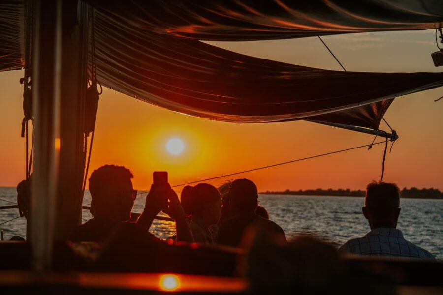 Argostoli: Sunset Cruise with Swim Stops, Dinner, and Wine - Leaving Argostoli harbor in the early evening