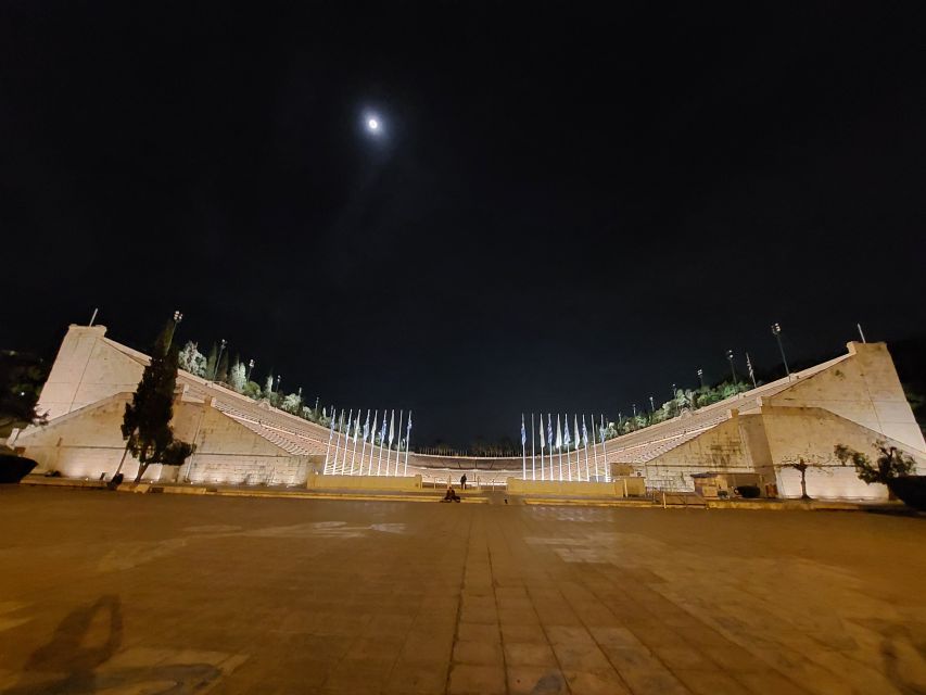 Athens: City Highlights Nighttime Walking Tour in Spanish - Panathenaic Stadium and Olympic memory