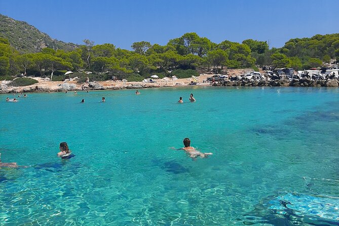 Athens: Full-Day Island Hopping Cruise with Lunch and Swimming - Moni: lunch beside a protected island