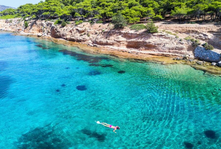 Athens: Full-Day Island Hopping Cruise with Lunch & Transfer - Agistri: pine hills, clear water, and village time