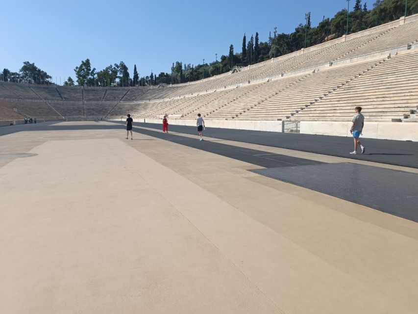 Athens Full-Day Private Sightseeing Trip - Ancient monuments around modern city streets