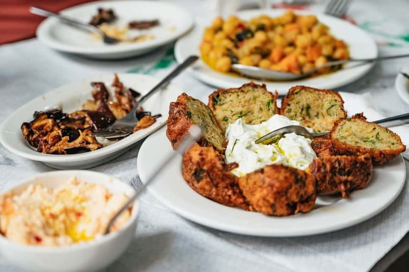 Athens: Greek Foodie Tour with Tastings - Walking through Varvakios Agora’s meat and fish market