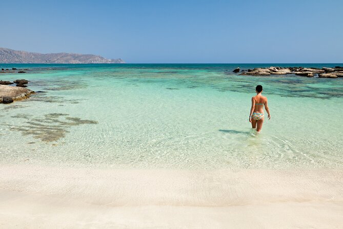 Athens: Island Swimming Day Cruise—DJ, Lunch & Drinks incl. - Aegina: food, pistachios, and a little freedom