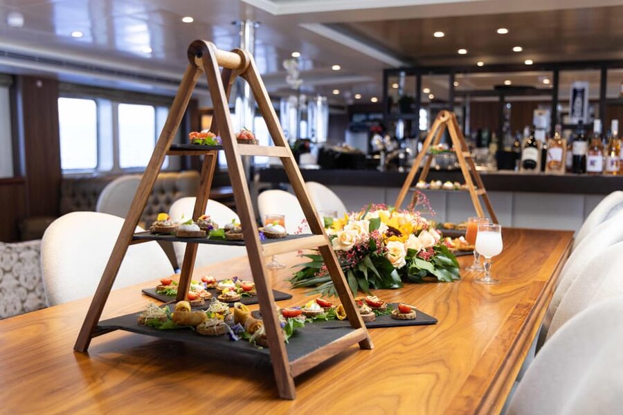 Athens: Saronic Islands Cruise with VIP Area Seating & Lunch - The return trip adds music and dancing