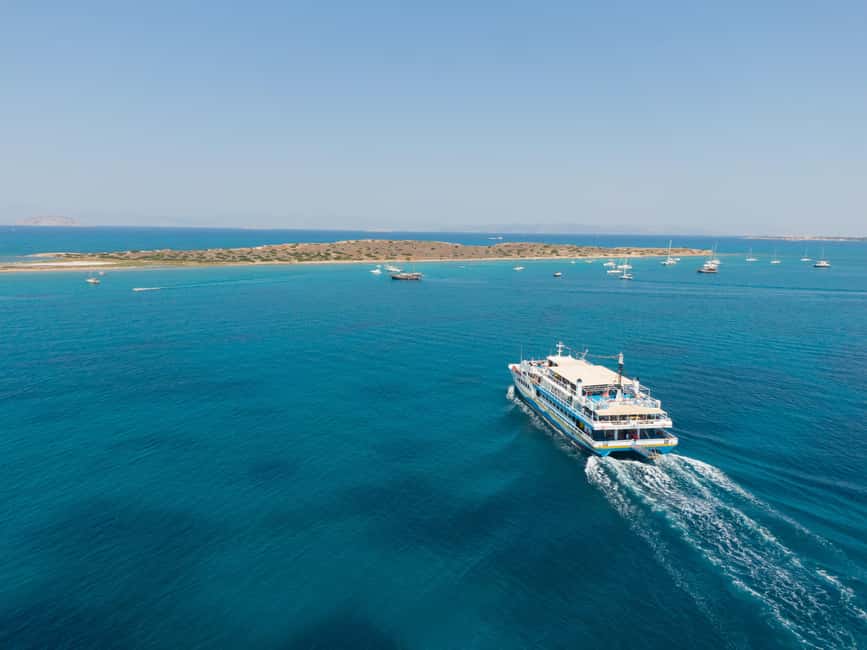 Athens: Swimming Cruise with Lunch, Wine & Live DJ on Board - Aegina: 105 minutes among shops and pistachios