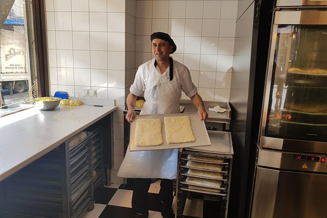 Athens: The Classic Food Tasting Tour - Walking through Varvakios food market