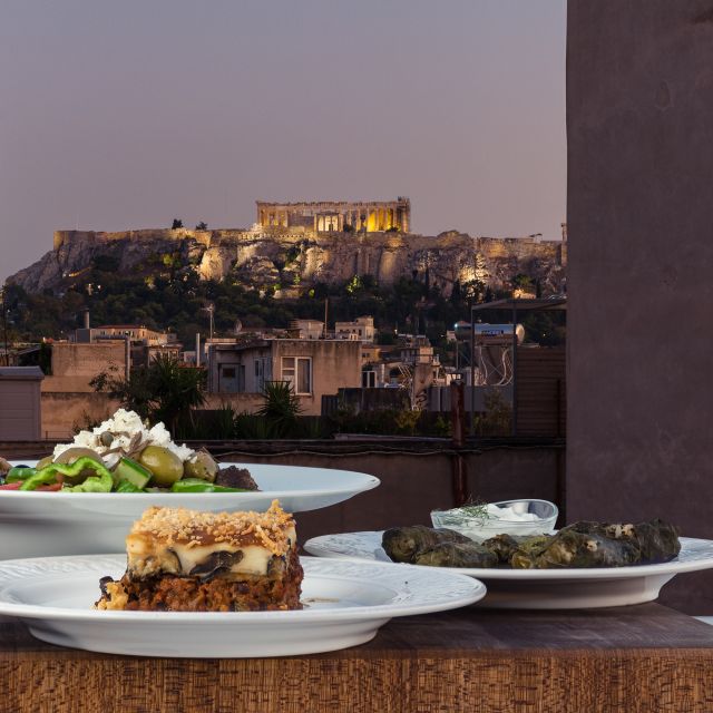 Athens: Traditional Greek Cooking Class with Full Meal - Cooking Greek food in a real working kitchen