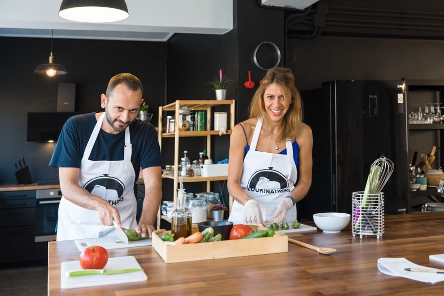 Athens: Traditional Greek Cooking Class with Full Meal - The welcome: wine, snacks, and a menu discussion