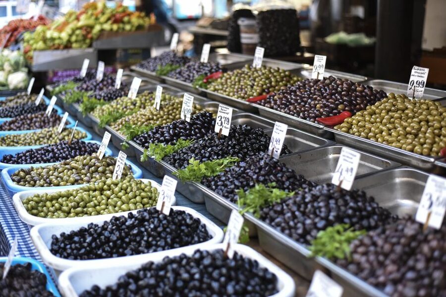 Athens: Ultimate Food Walking Tour with 15 Tastings - A sit-down lunch inside the market