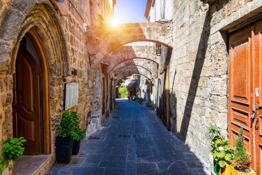 Best of Rhodes Tour including Lindos and Medieval City - Entering Rhodes Old Town through medieval streets