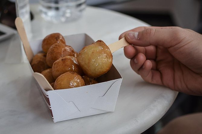 Best Seller: Semi-Private Athens Morning Food Tour (15+ tastings) - Greek cheese and yogurt at a local deli
