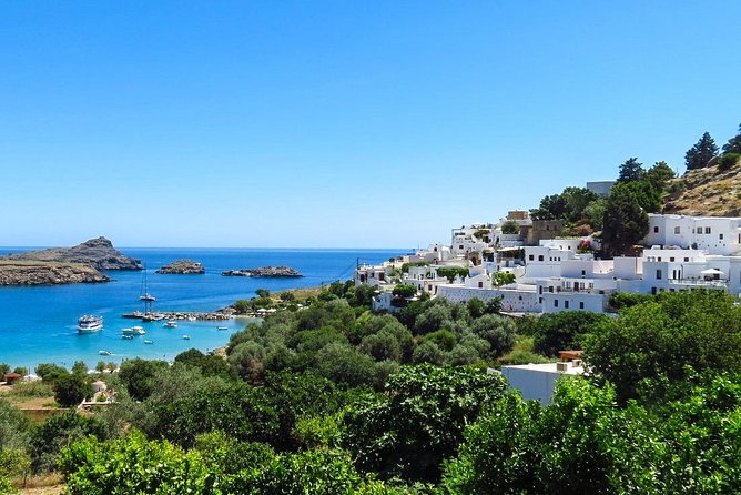 Boat Trip to LINDOS with Swimming Stops at Anthony Quinn's & Tsambika Bays - Getting to the harbor and boarding