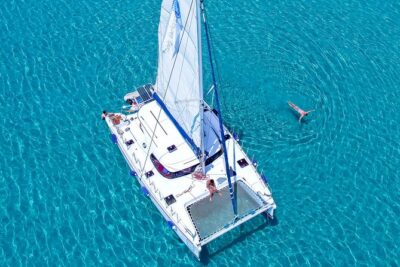 Catamaran Full-Day of Milos and Poliegos With Lunch & BBQ