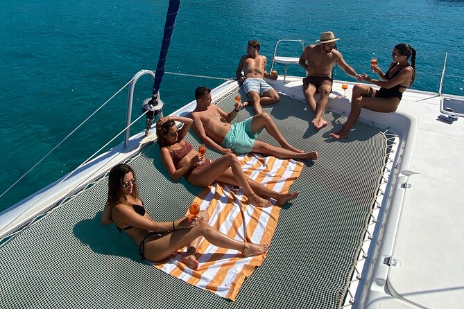 Catamaran Full-Day of Milos and Poliegos With Lunch & BBQ - Theiorychia and Milos mining history