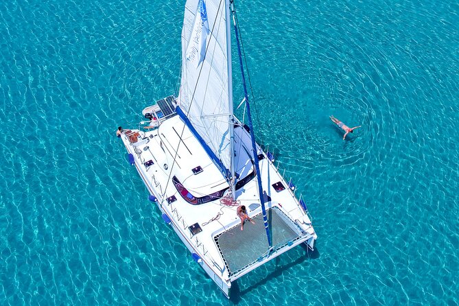 Catamaran Full-Day of Milos and Poliegos With Lunch & BBQ - Cape Vani and the old mining coast