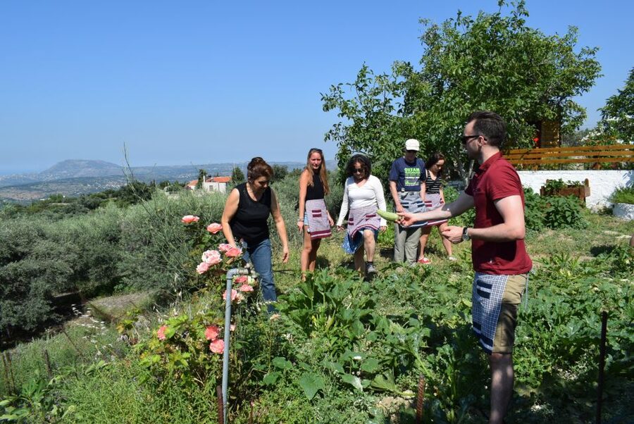 Chania: Authentic Cooking Class in the White Mountains - The garden walk explains the food before you cook it