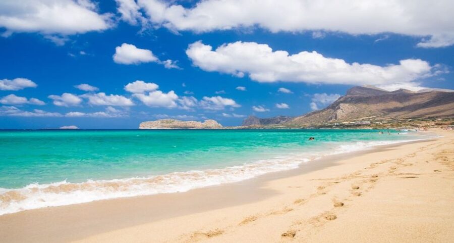 Chania: Falassarna Beach Sunset Trip with Transfer - The air-conditioned coach ride west