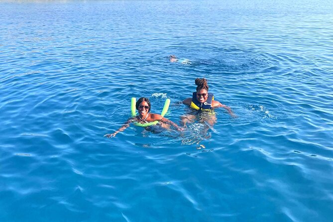 Chania: Morning Catamaran Cruise with Premium Lunch & Drinks - Lunch with seafood, chicken, wine, and dessert