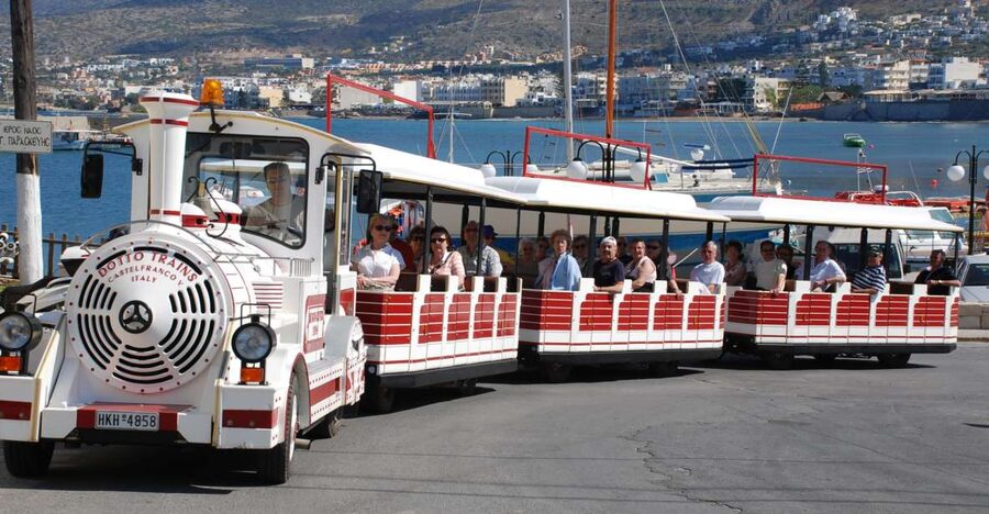 Chersonissos: Mini-Train City Highlights Tour - Boats and harbor views at Chersonissos port