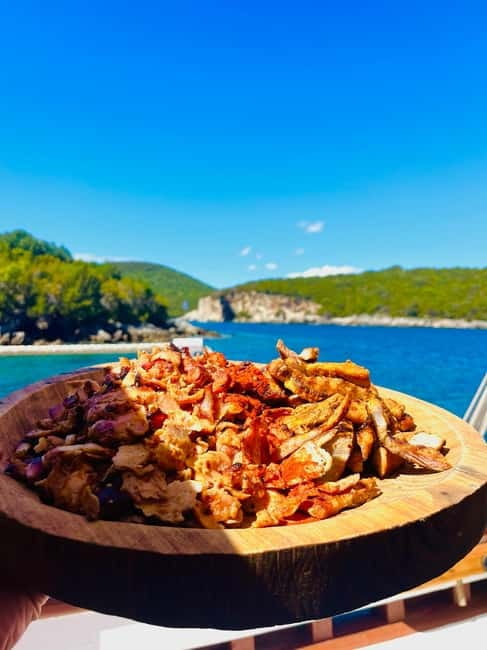 Corfu: Blue Lagoon and Cave Cruise with Drinks and Lunch - Why the small wooden boat matters