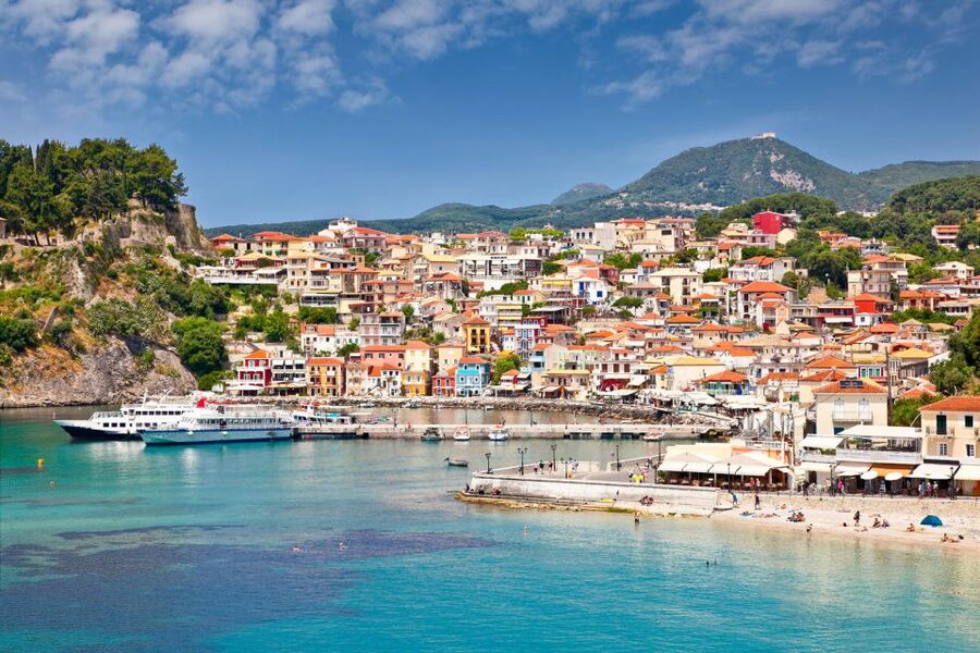 Corfu: Parga, Sivota and Blue Lagoon Full-Day Boat Cruise - Entering a Sivota cave by boat