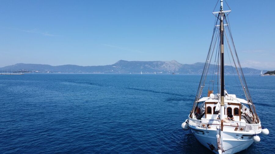 Corfu: Sunset Cruise on Classic Boat with Cocktails & Snacks - Reaching Pontikonissi at the right time