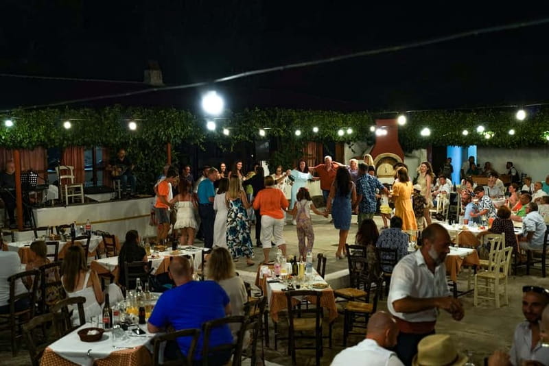 Cretan Night: Dinner & Live Show at Pano Karouzanos Village - A sunset road into the Cretan hills
