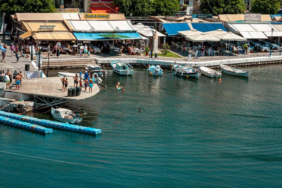 Crete: Agios Nikolaos, Plaka and Spinalonga Island Tour - The short boat ride from Plaka to Spinalonga