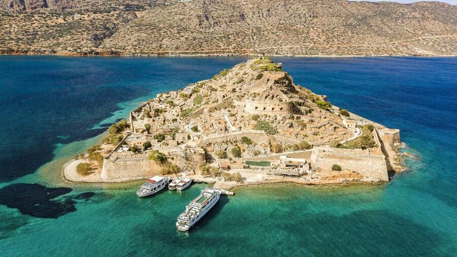 Crete: Day Trip to Agios Nikolaos and Spinalonga Island - Transport, guides, and the long ride home
