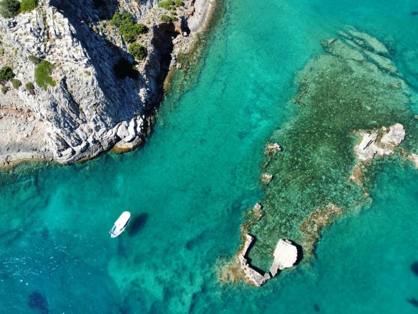 Crete: Fishing & Swimming Boat Cruise with Lunch & Drinks - Swimming and snorkeling in clear water