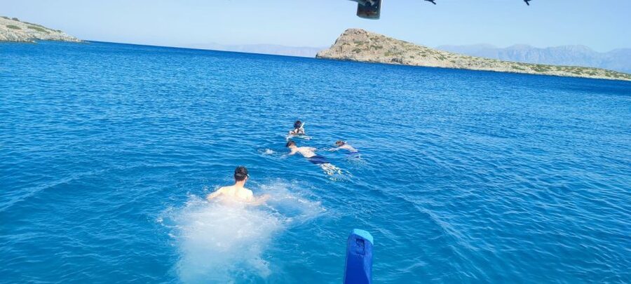 Crete: Fishing & Swimming Boat Cruise with Lunch & Drinks - What the day feels like from start to finish