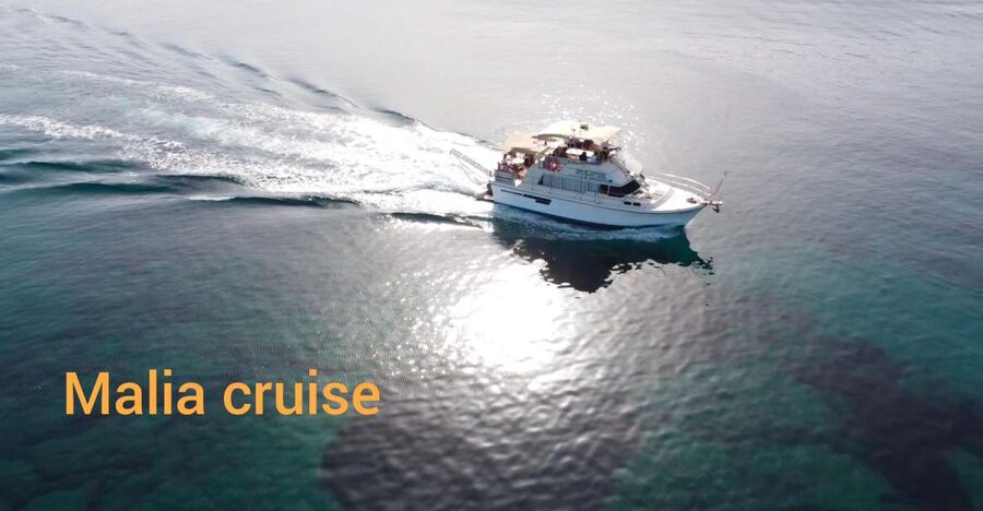 Crete: Snorkeling Boat Trip with Lunch and Transfer - The first swim stop: simple, refreshing, and brief