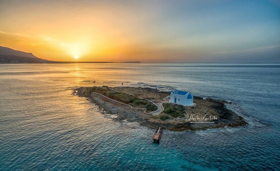 Crete: Snorkeling Boat Trip with Lunch and Transfer - Saint George Bay from the water
