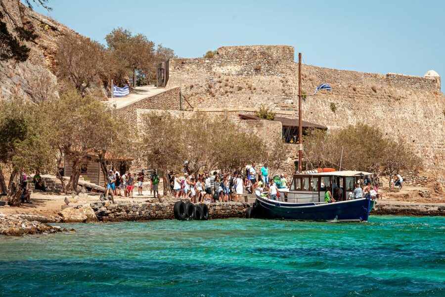 Elounda: Spinalonga Guided Boat Tour with BBQ and Swimming - What the $29 price really covers