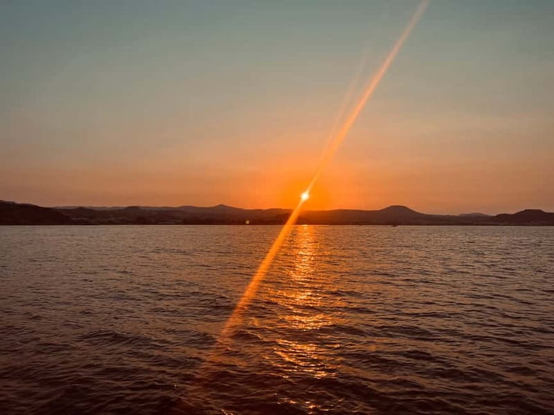 Faliraki: Sunset Cruise with Unlimited Aperol, Beers & Wine - Leaving Faliraki Harbour at Sunset