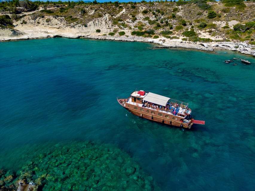 Faliraki : Transfer & Cruise to Lindos with 3 Swimming Stops - The day at a glance