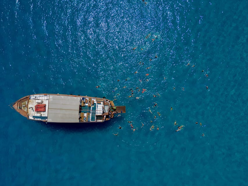 Faliraki : Transfer & Cruise to Lindos with 3 Swimming Stops - Navarone Bay: the first 25-minute swim