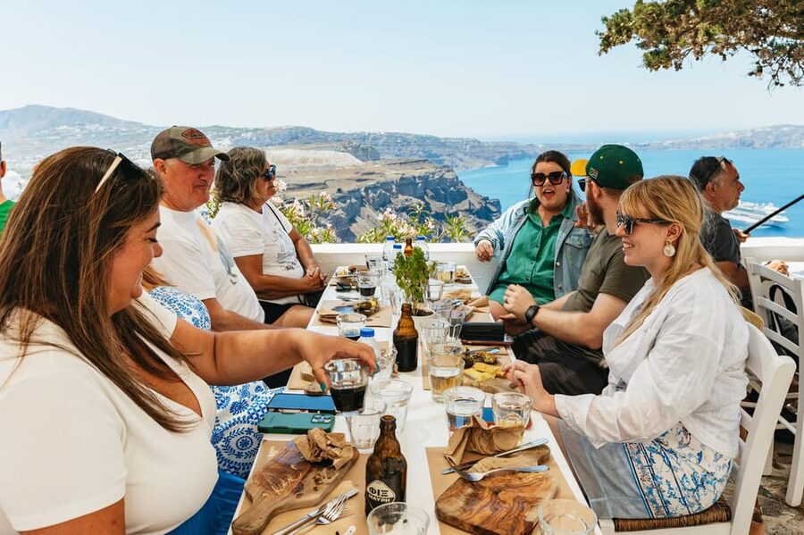 Fira: Guided Foodie Walking Tour with Tastings - Meeting at Agios Gerasimos Square in Firostefani
