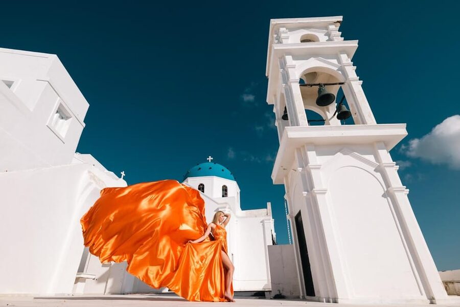 Flying dress Photoshoot in Santorini with Hotel Pickup - Imerovigli gives you the classic Santorini frame