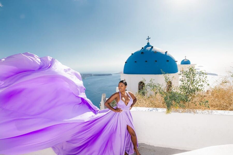 Flying dress Photoshoot in Santorini with Hotel Pickup - Photo delivery: excellent value, but confirm the number