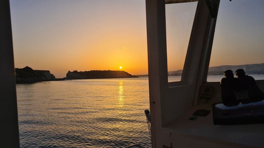 From Argostoli: Vardiani Island Sunset Cruise & Greek Meze - Xi Beach after dark