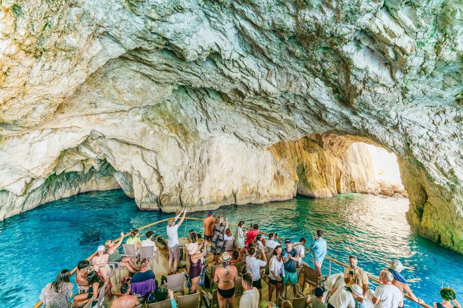 From Corfu Island: Antipaxos & Paxos Blue Caves Boat Cruise - Guides, crew, and onboard atmosphere