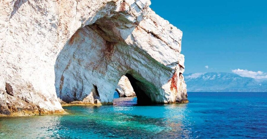 From Kefalonia: Blue Cave Boat Cruise & Shipwreck Photo Stop - Mounda Beach and the best swimming break