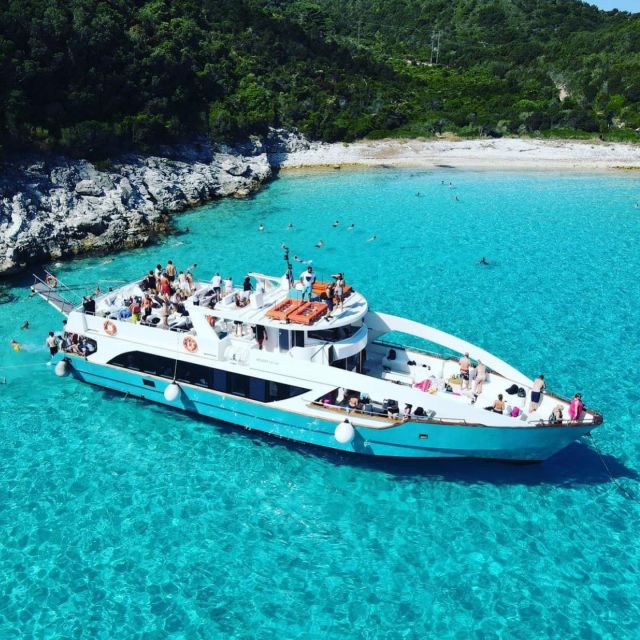 From Lefkimmi: Syvota, Blue Lagoon and Cave Sunset Cruise - Entering the Sivota Cave by boat