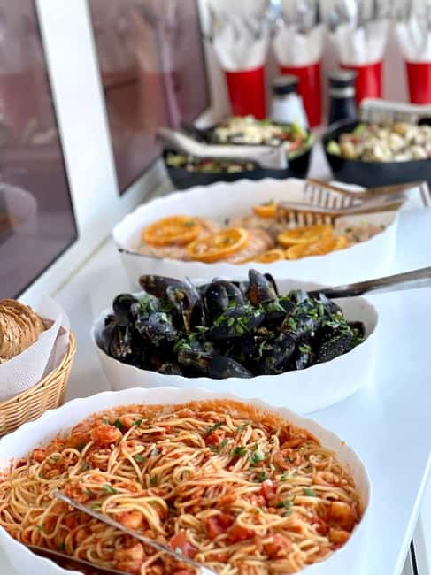From Panormo: Luxe All-Inclusive Catamaran Cruise with Lunch - A Mediterranean lunch made on the boat