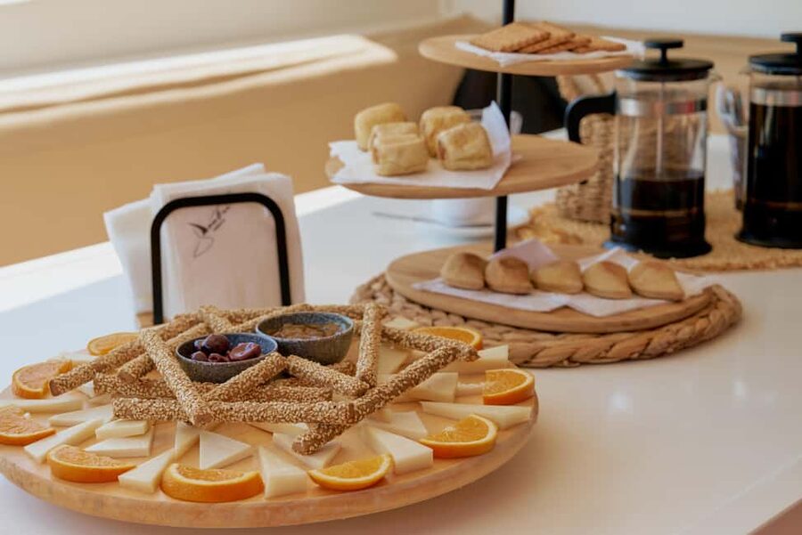 From Panormo: Luxe All-Inclusive Catamaran Cruise with Lunch - Starting in Panormo with coffee and local snacks